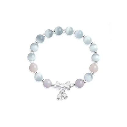 Lavender amethyst opal bracelet with crystal bowknot charm measuring 10mm