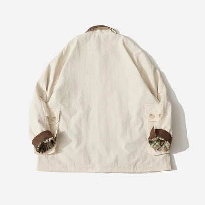 Green and apricot coloured casual polyester jacket with long sleeves and side seam pockets