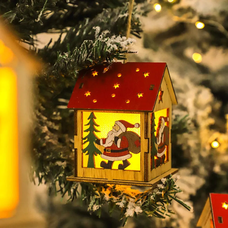 Wooden festive pendant with LED illumination in snowman, Santa Claus, or elk design measuring 7cm by 7cm by 9cm
