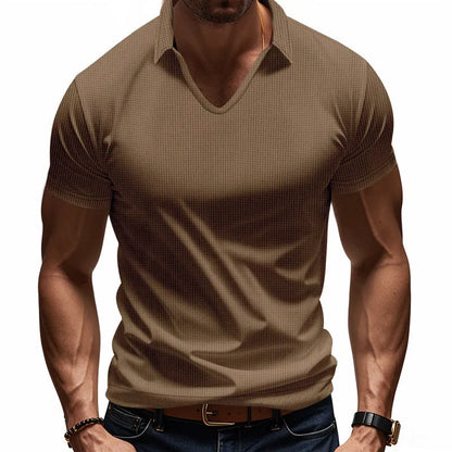 Man modelling a loose-fit apricot coloured V-neck short-sleeve T-shirt for casual summer wear.