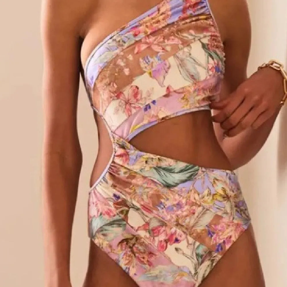 Rose gold patterned women's swimsuit on a white background