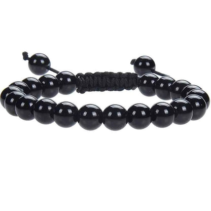 Women's flat knot braided healing bracelet hand-woven with natural gemstone beads in geometric pattern