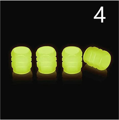 Glow-in-the-dark rubber tyre valve caps in five colour options on tyre valve stem
