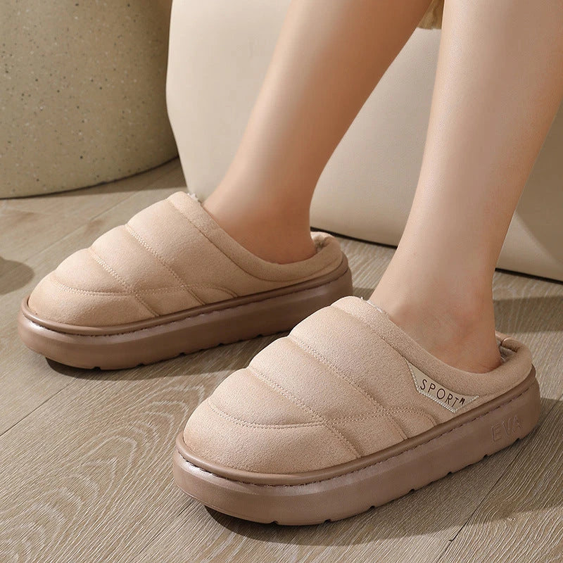 Cozy plush slip-on slippers in various colors, featuring a soft suede-like upper and a supportive EVA sole for maximum comfort and warmth.