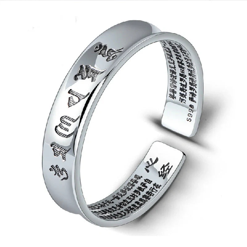 Silver-plated bracelet with engraved inspirational words, vintage-inspired design, elegant and sophisticated accessory