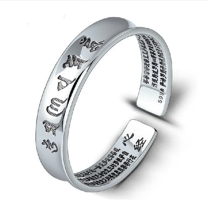 Silver-plated bracelet with engraved inspirational words, vintage-inspired design, elegant and sophisticated accessory