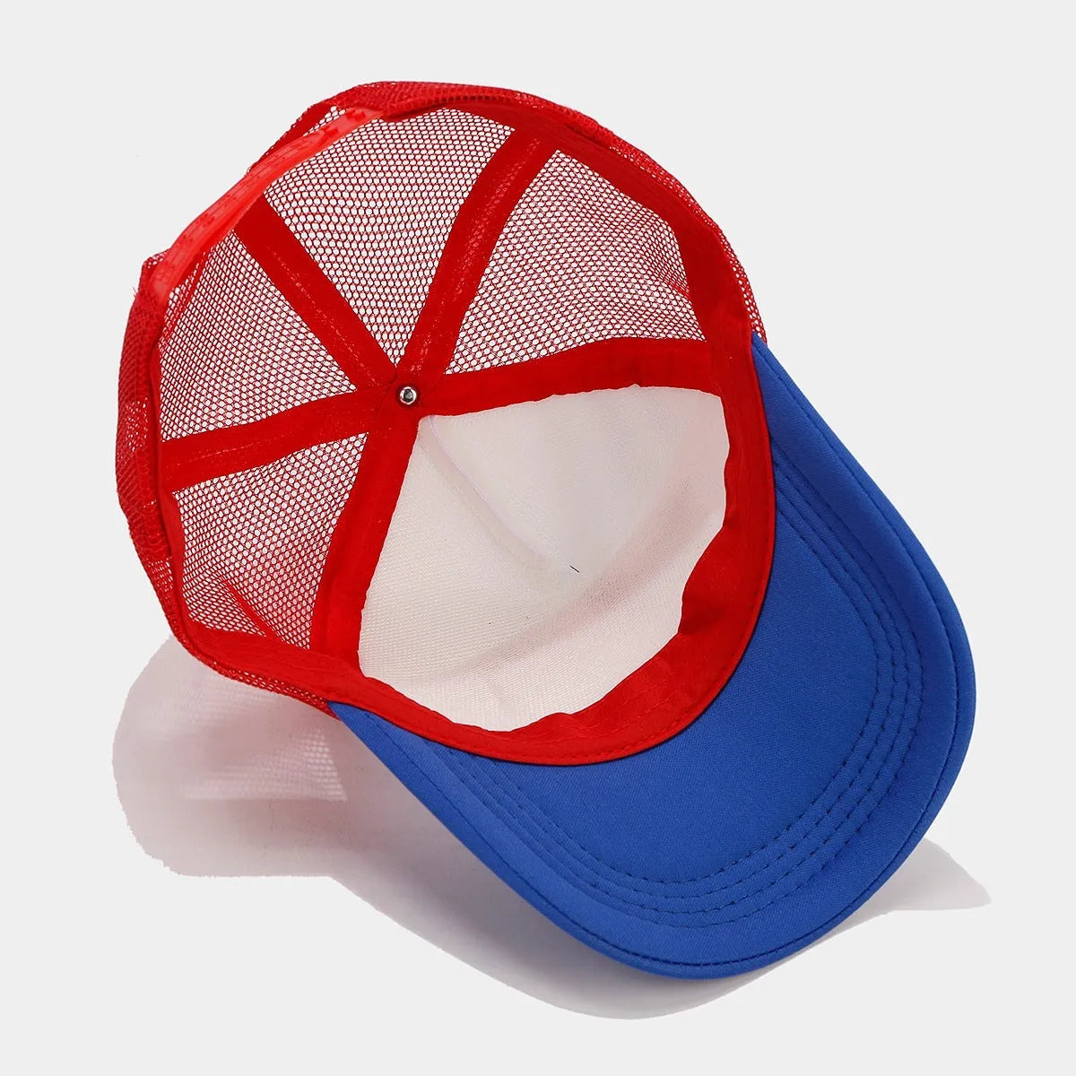 Red and blue contrasting colour breathable mesh baseball cap with adjustable strap