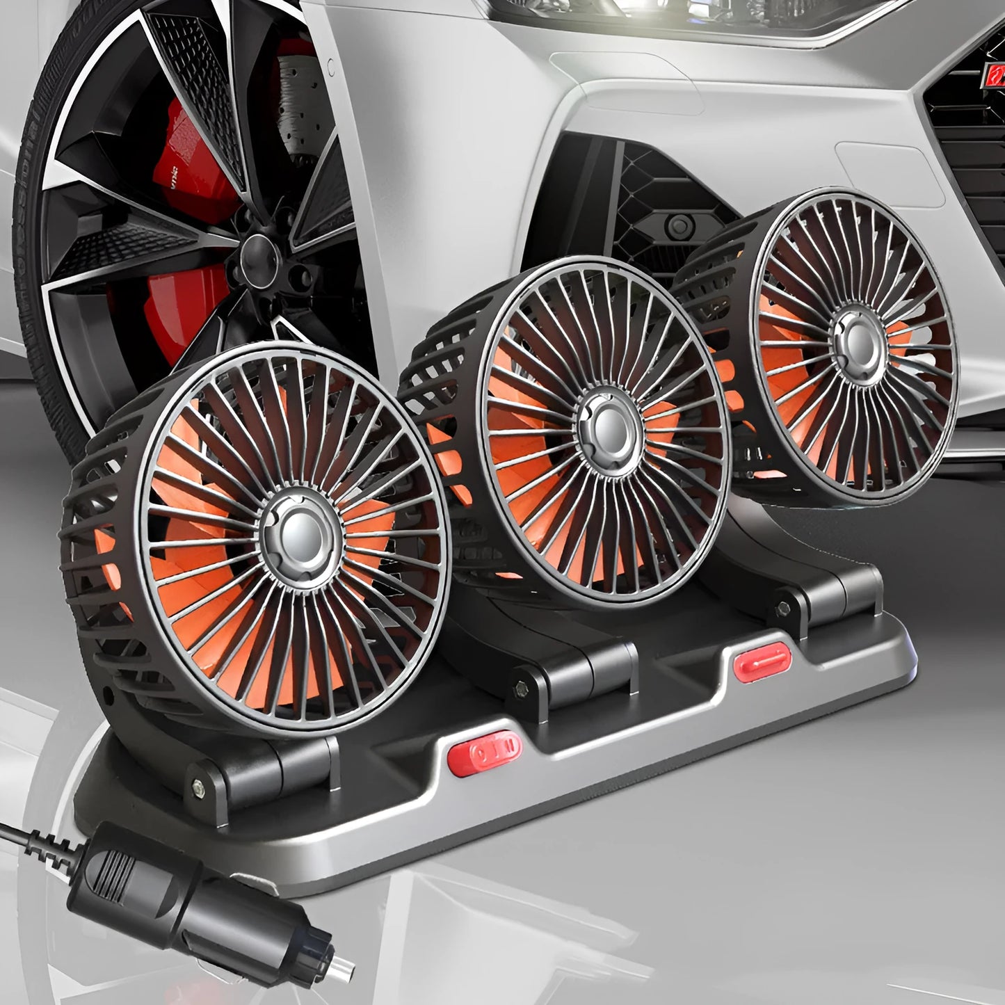 Three-head adjustable 12V car cooling fan with USB and cigarette lighter plugs on a dashboard.