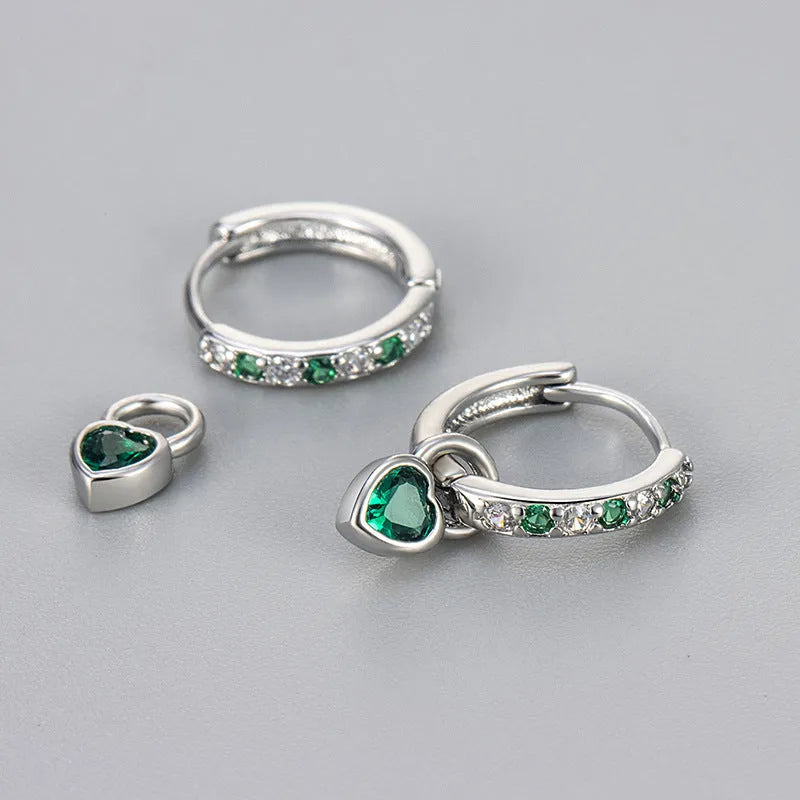 Women's fashion earrings with heart-shaped eardrops, diamond-treated gemstones in gold or white gold plating, approximately 2.5 cm long