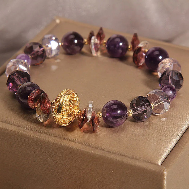 Purple crystal bracelet with pumpkin beads and rhinestone decoration