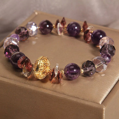 Purple crystal bracelet with pumpkin beads and rhinestone decoration