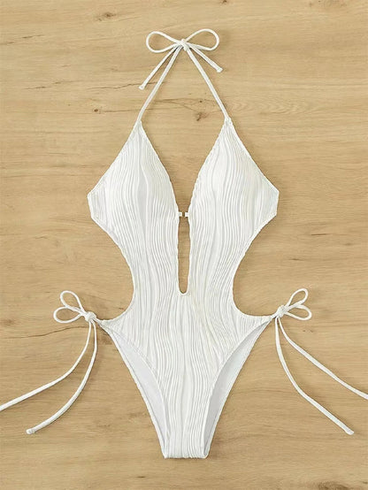 Women's black lace-up triangle bikini swimsuit made from polyester fabric
