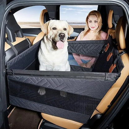 Grey water resistant rectangular dog bed with raised sides on a car back seat.