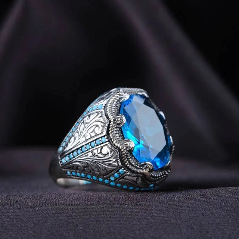 Antique silver geometric alloy ring with blue zircon stones on size chart showing 7-13
