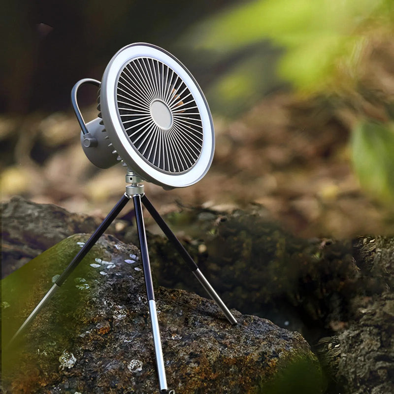 Portable USB rechargeable camping fan with tripod stand, offering adjustable lift, timing functions, and multiple mounting options as a desktop fan, ceiling fan, or hanging lantern for outdoor tent air circulation