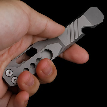Titanium alloy multi-function crowbar tool with bottle opener on a stone wash finish background.