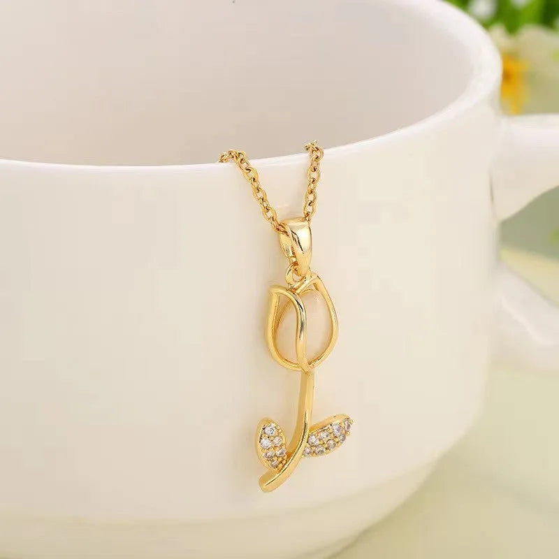 Zircon Tulip necklace with floral pendant on adjustable O-ring chain in gold colour options