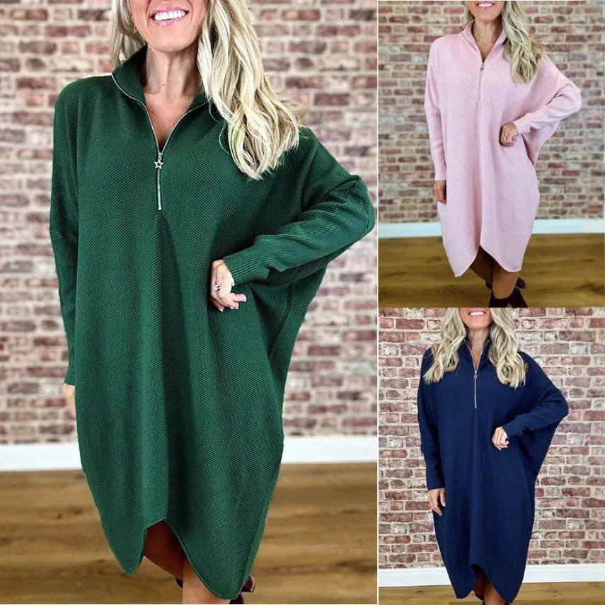 Women's solid colour loose knitted dress with a front zipper and raglan sleeves.