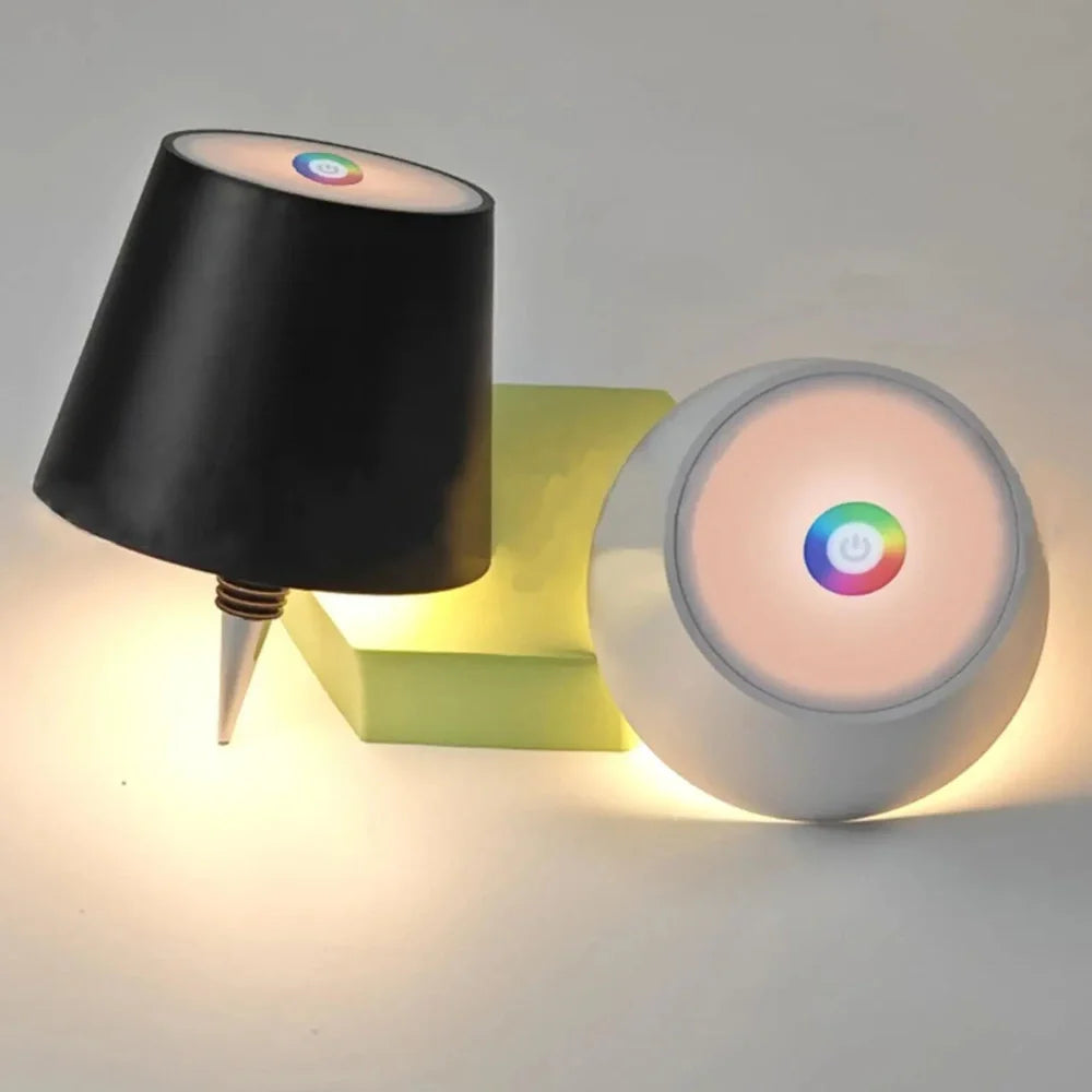 Wireless LED desk lamp in black tricolour finish, bottle-shaped with detachable base and touch control for 2000mAh powered lighting