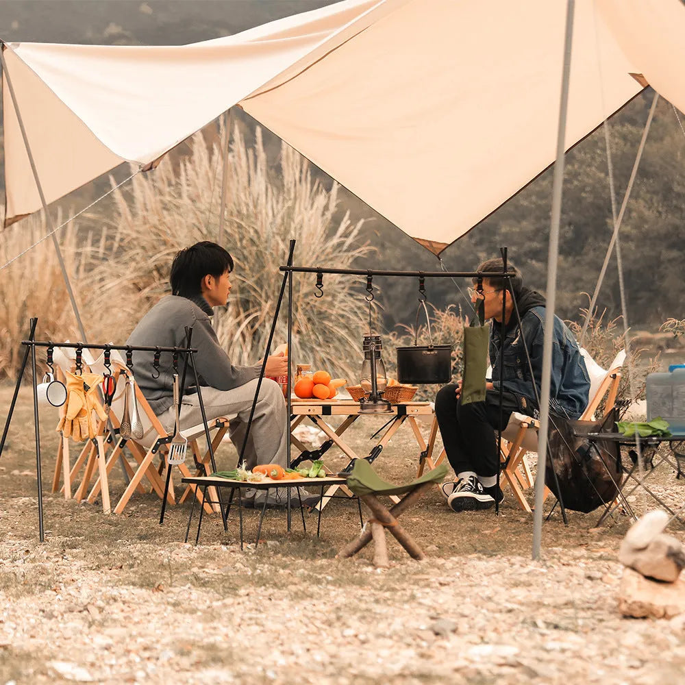Aluminium alloy folding clothes drying rack with triangle frame and side hanger hooks for camping.