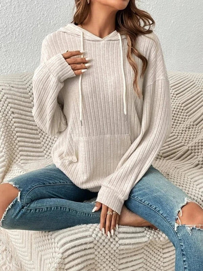 A stylish and comfortable hooded sweatshirt with drawstring and pockets, available in various colors.