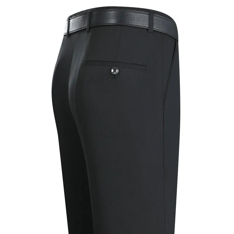 Man wearing dark blue straight-leg non-iron business trousers with a mulberry silk blend fabric.