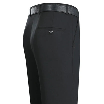 Man wearing dark blue straight-leg non-iron business trousers with a mulberry silk blend fabric.