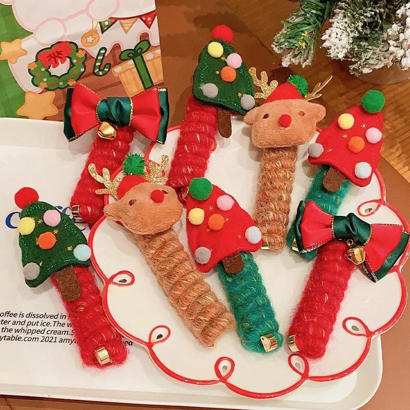 Festive Christmas-themed hair ties with cute designs like bells, trees, and reindeer for kids