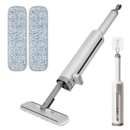 Rotatable self-squeeze mini mop with crevice brush attachment and microfiber pads for compact floor cleaning