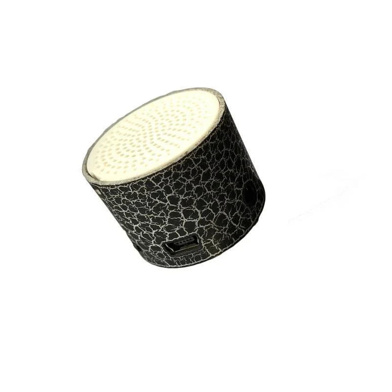 Compact wireless Bluetooth speakers in various colours, featuring premium audio components and sleek, durable design