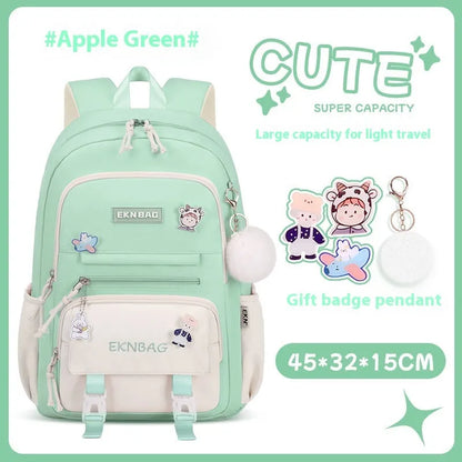 Pink girls school backpack with curved shoulder straps on a wooden floor