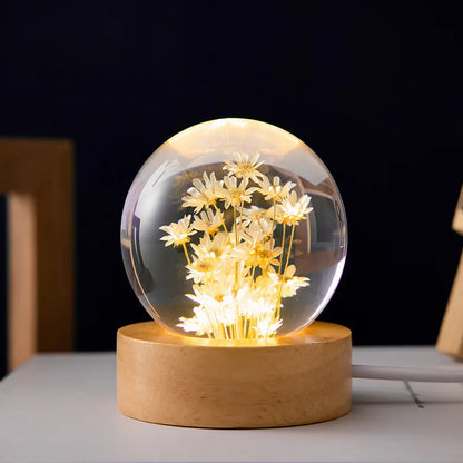 USB-powered 3D dandelion crystal ball night light on a natural beech wood stand.