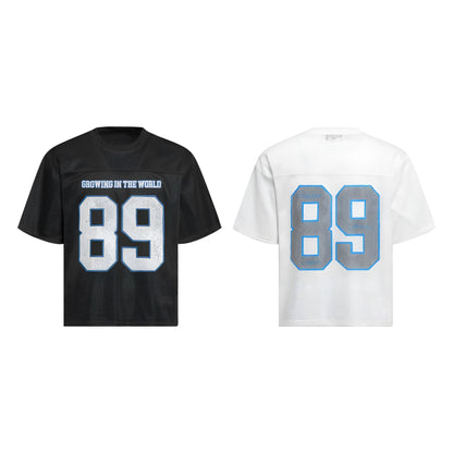 Black loose-fit casual T-shirt with white alphanumeric graphic printing on the front.