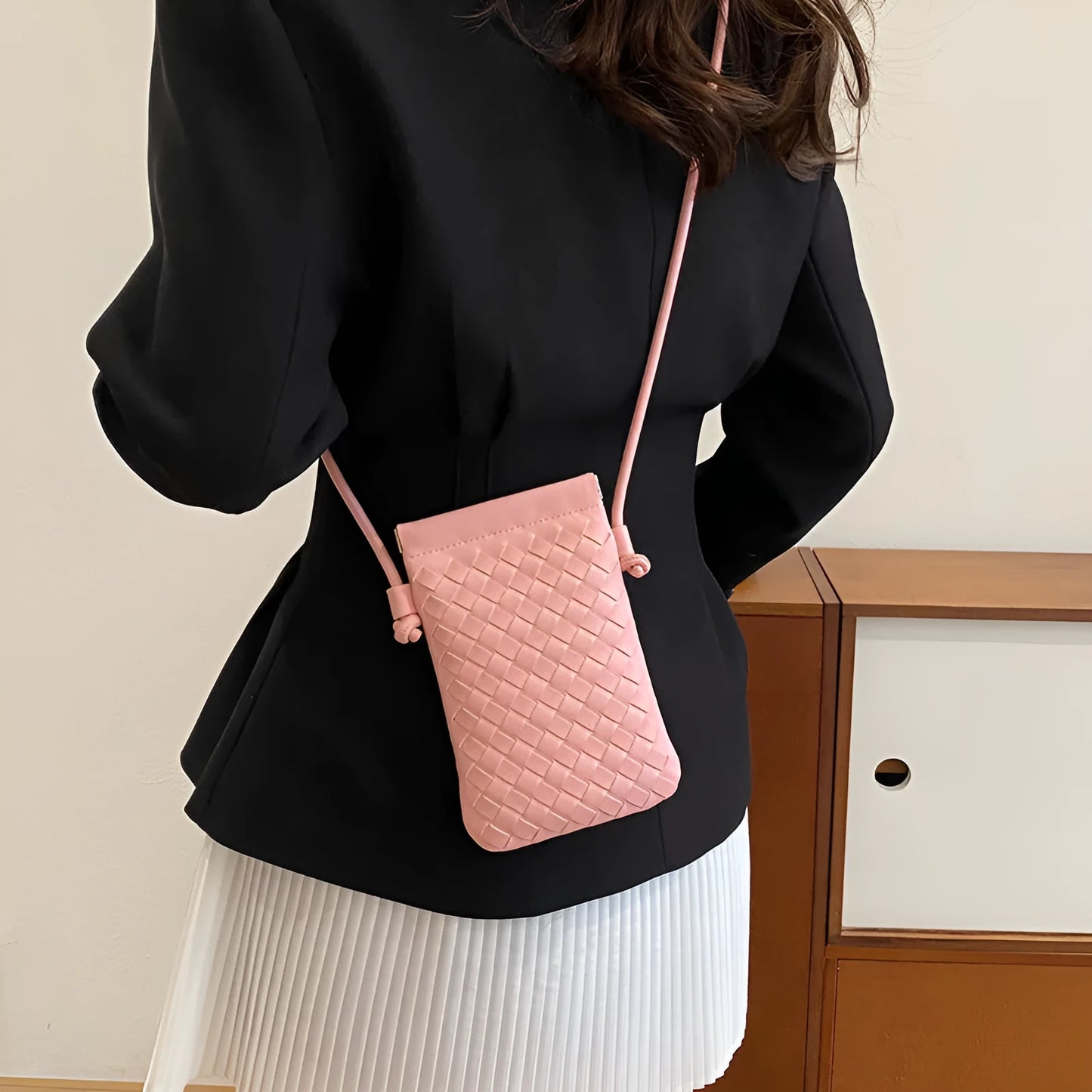 Vintage weave crossbody phone bag in pu leather showing vertical square design and dark cell interior
