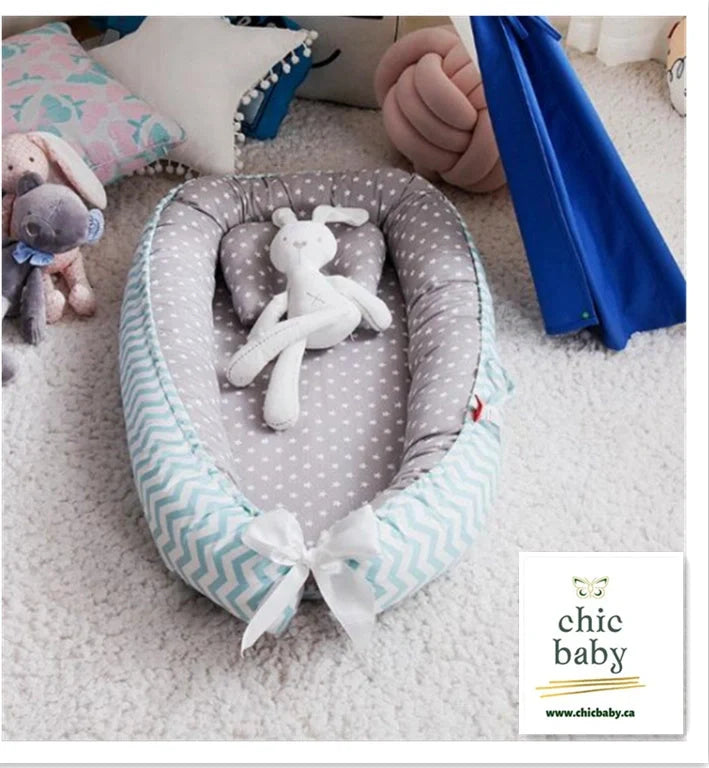Cotton baby travel crib with removable washable cover in various cartoon designs