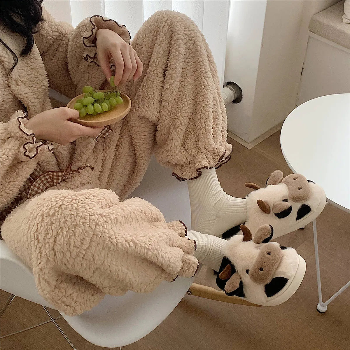 White cow animal slippers with plush faux fur and non-slip PVC soles for women