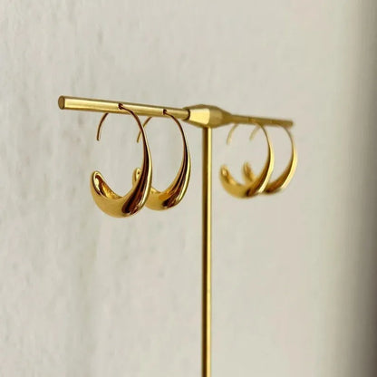 Women's snake motif alloy earrings with gold electroplated finish