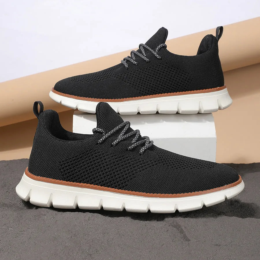 Men's grey and black low-heel casual sneaker with mesh fabric upper and round toe