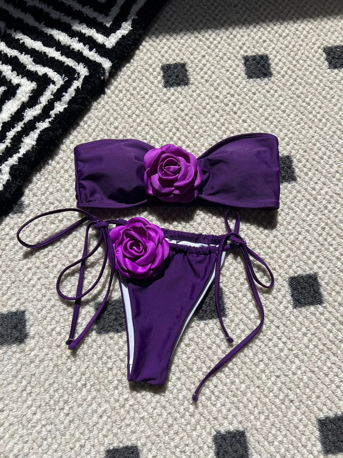 Women's solid colour drawstring tube top swimsuit in brief style, shown in one of nine available colours.