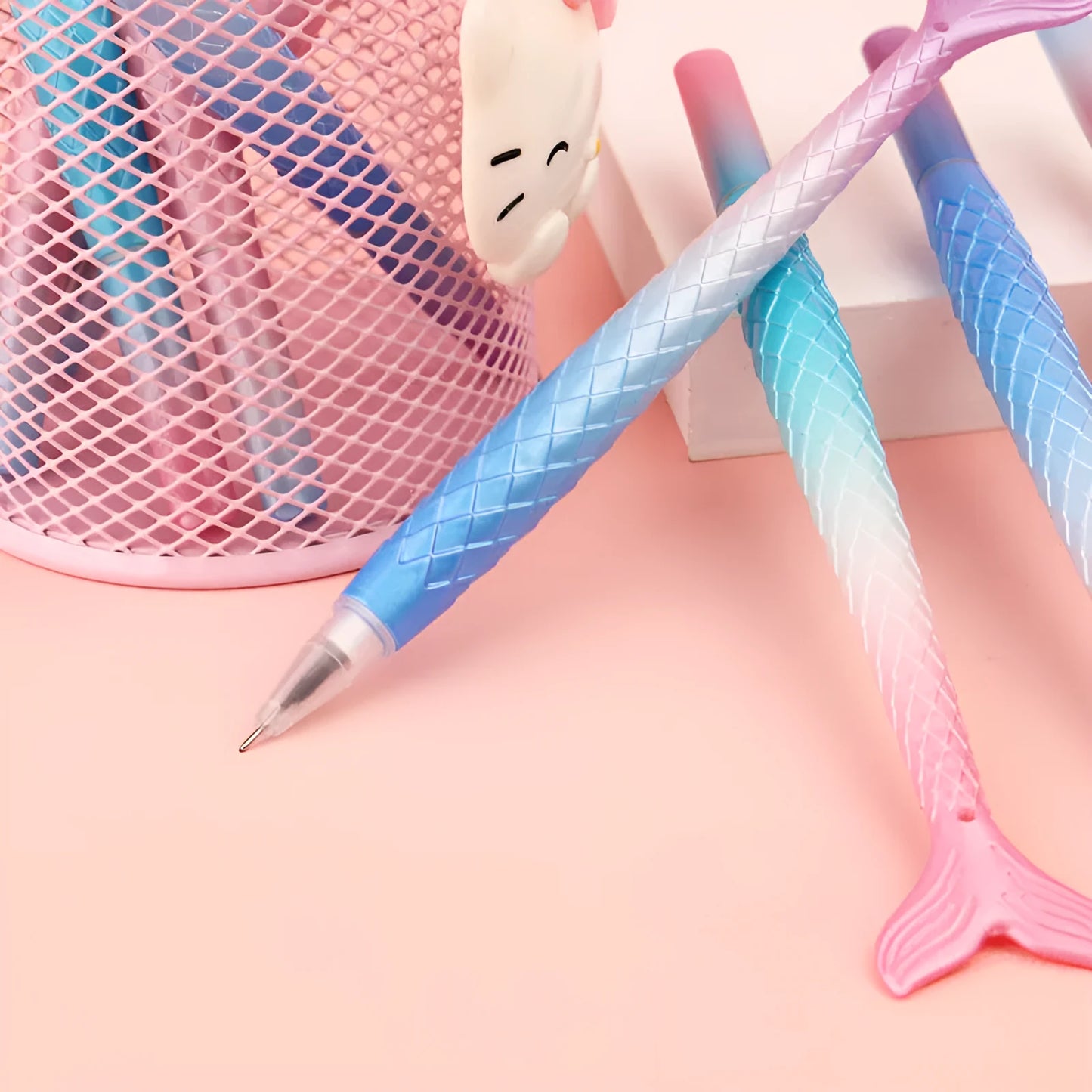 Cartoon mermaid design pen with a 0.38mm needle tip on a plastic barrel.