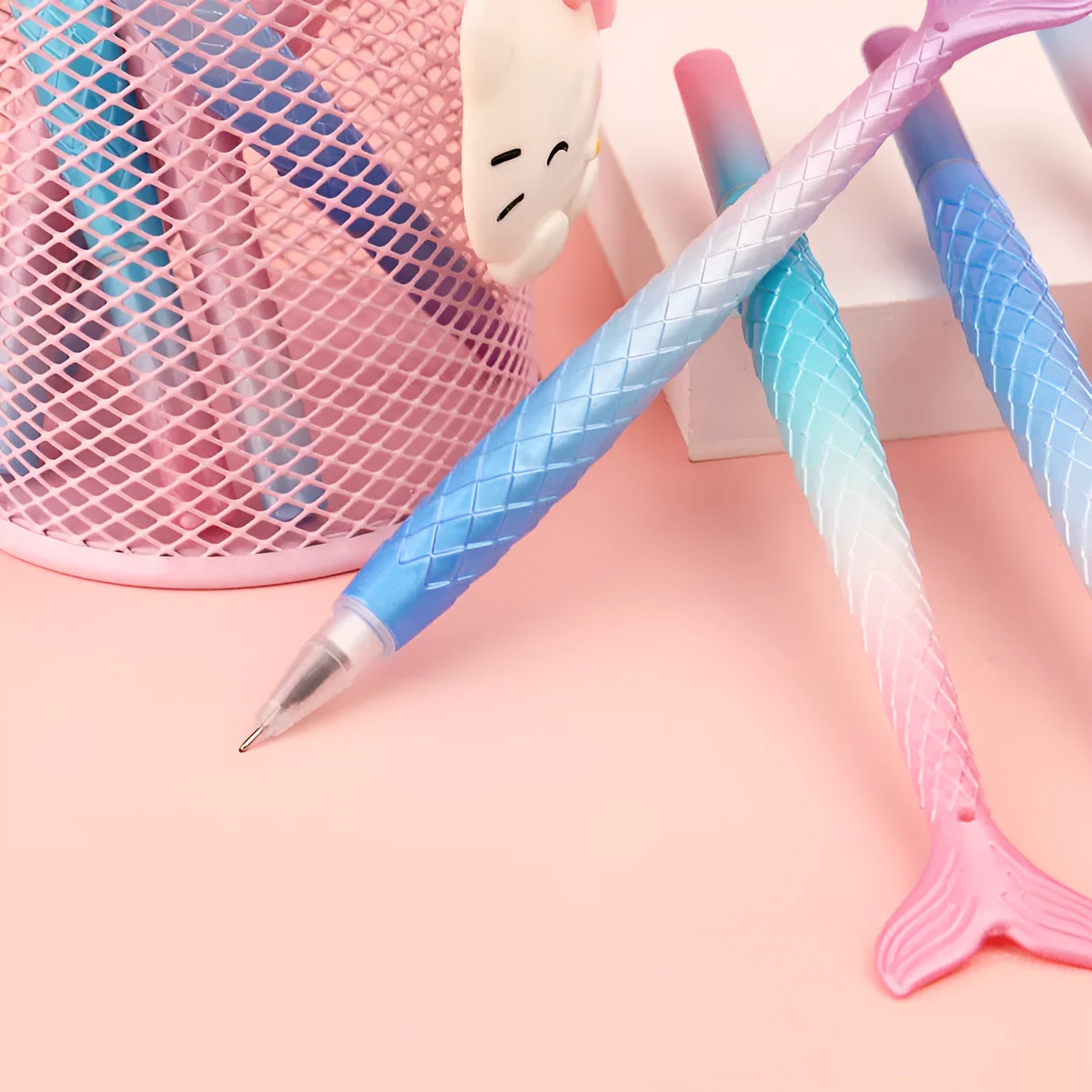 Cartoon mermaid design pen with a 0.38mm needle tip on a plastic barrel.