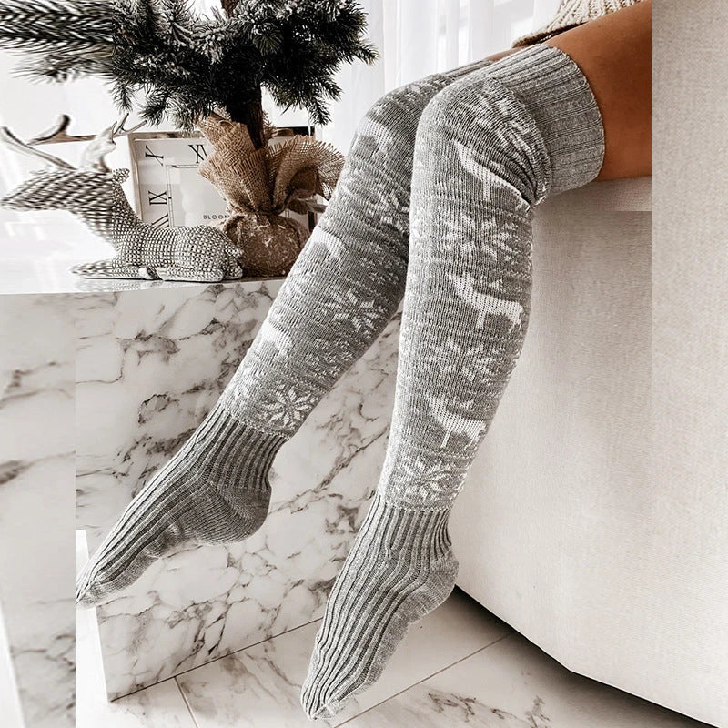 Cozy Christmas knee-high socks with festive elk and snowflake patterns