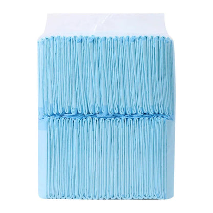 Pack of disposable pet urinal pads showing layered construction and size options S, M, L, XL for dogs and cats.