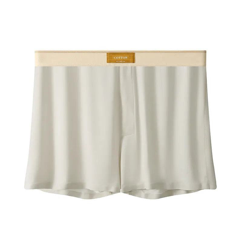 Pack of three pairs of solid colour men's ice silk briefs on a white background
