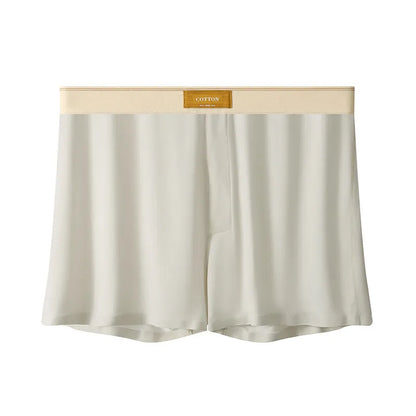 Pack of three pairs of solid colour men's ice silk briefs on a white background