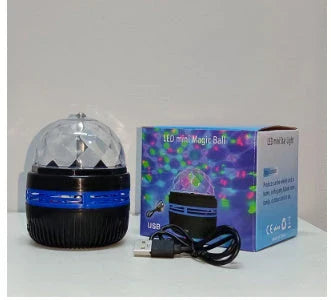LED Galaxy Star Projector with rotating color-changing display, creating a soothing starry night effect in a bedroom