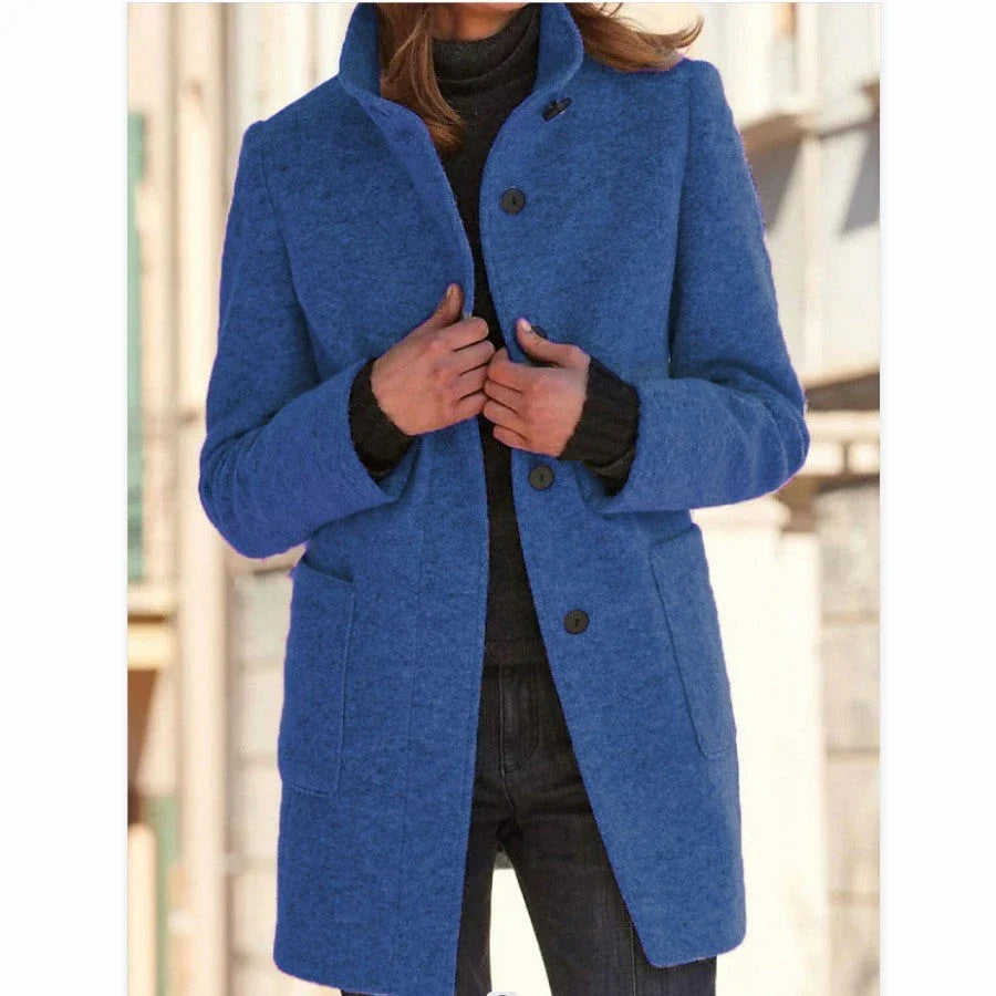 Stylish wool coat with stand collar, pockets, and slim fit design for casual winter wear.