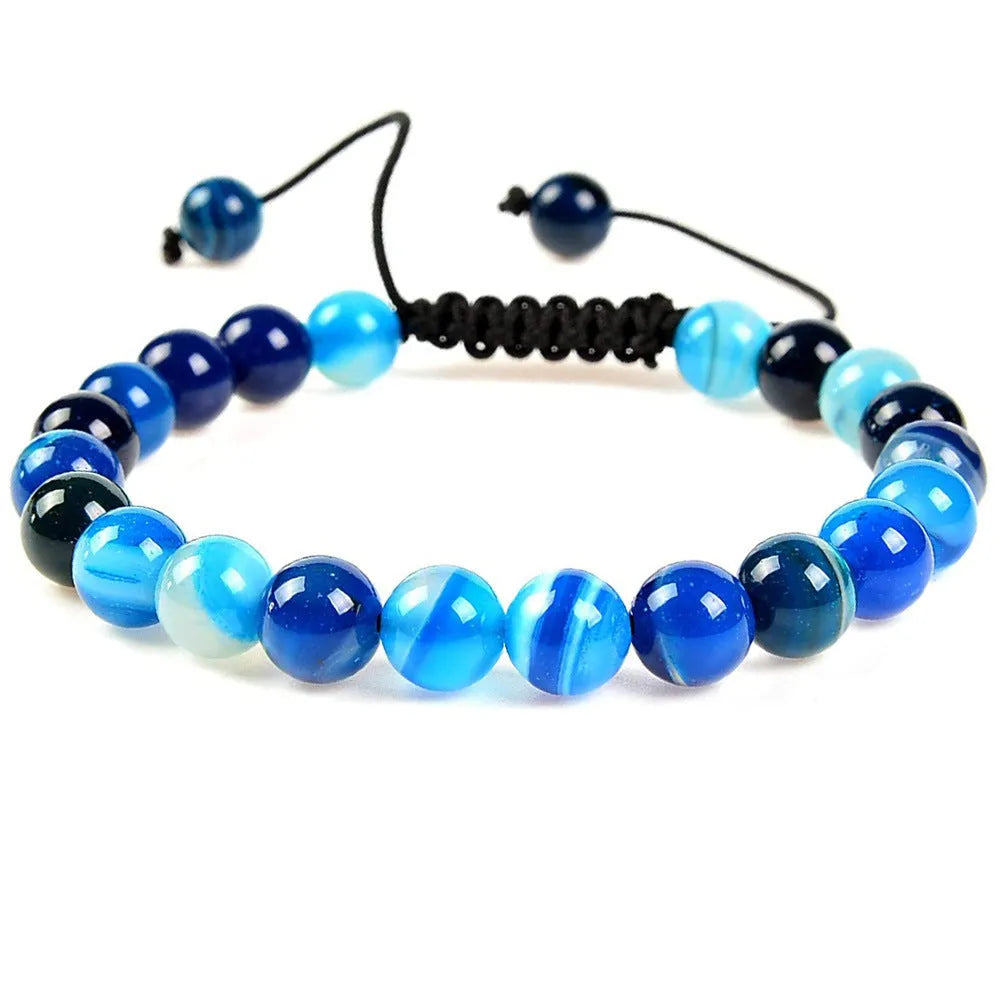Women's flat knot braided healing bracelet hand-woven with natural gemstone beads in geometric pattern