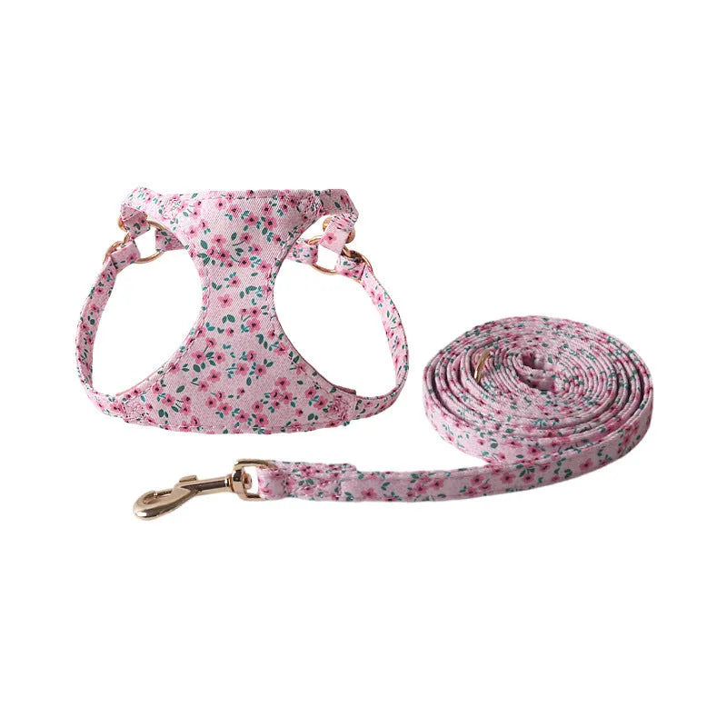 Orange cloth dog harness and leash set from the floral series, showing the single chest back design.