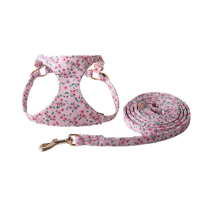 Orange cloth dog harness and leash set from the floral series, showing the single chest back design.